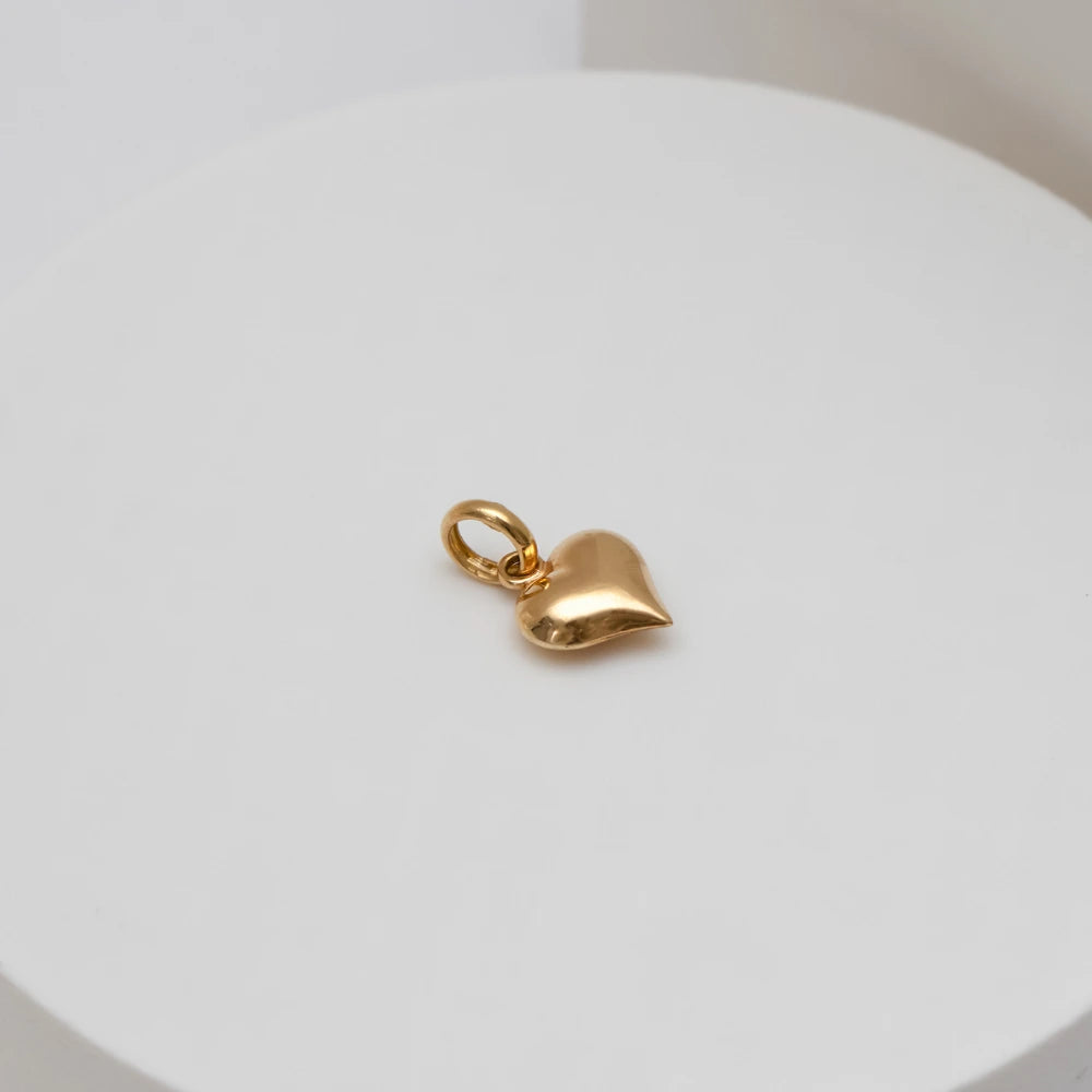 Pumped Heart Charm